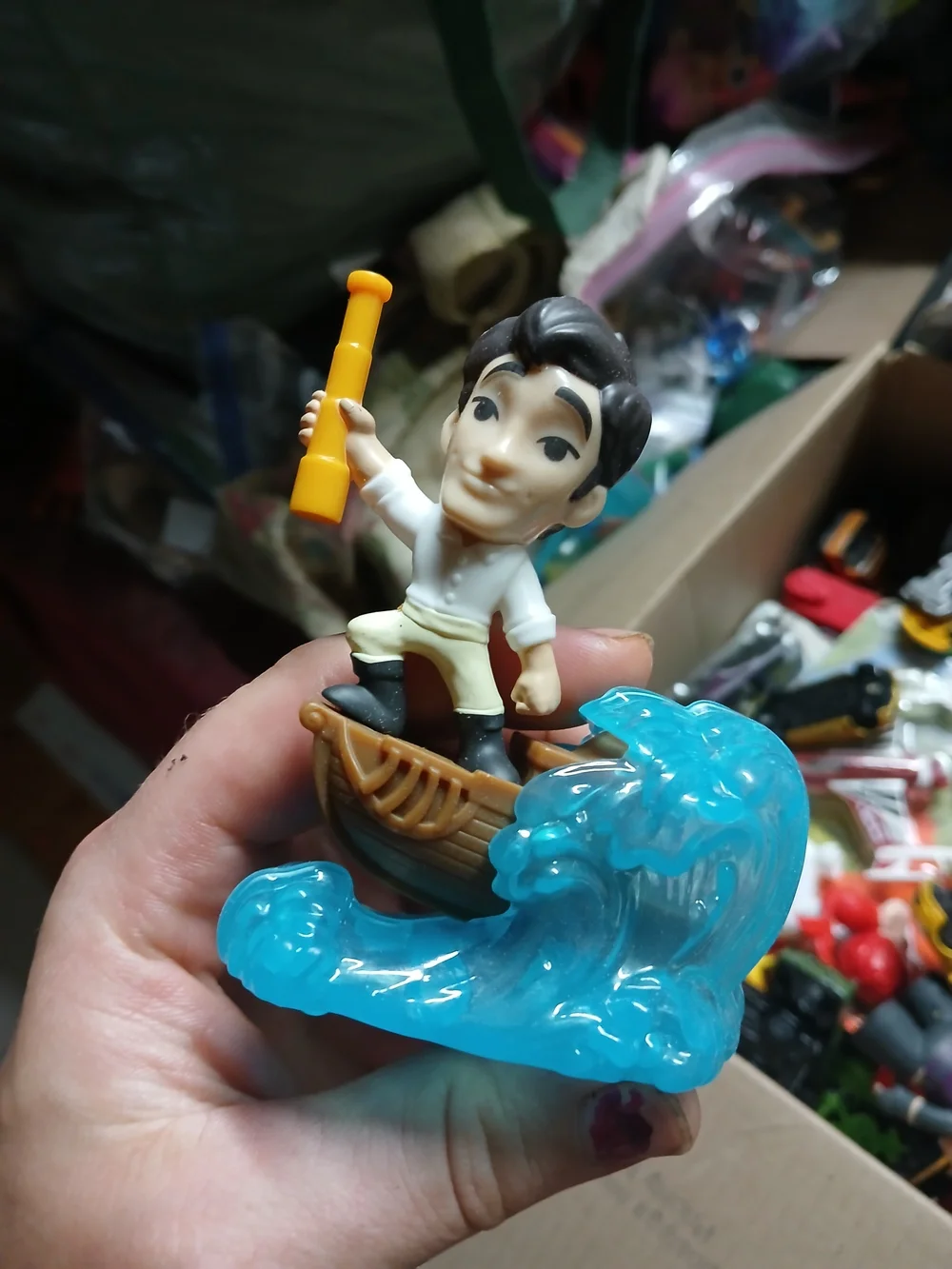 McDonald's Brown-Haired Sailor Figure with Yellow Spyglass and Blue Wave